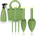 Set di accessori nero per spazi esterni include cazzuola piante